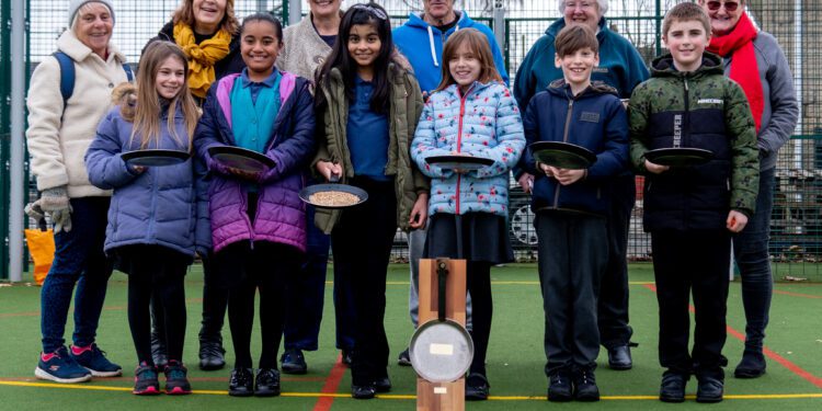 Flipping good fun at school pancake race