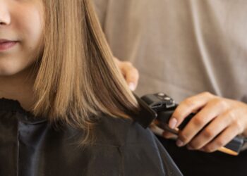 Melksham girl lops off locks for childhood cancer charity