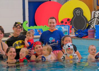 Local swimming teacher leads babies’ splashathon event for good causes