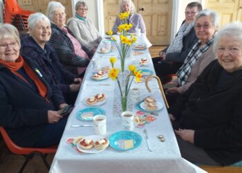 Social group celebrates eight years of friendship