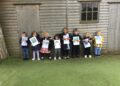 Children embark on sponsored walk for reading den