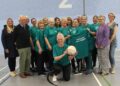 Walking netball team have new tops thanks to charity donation