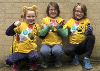 Triplets complete fundraising ‘Tripathlon’ for Children in Need