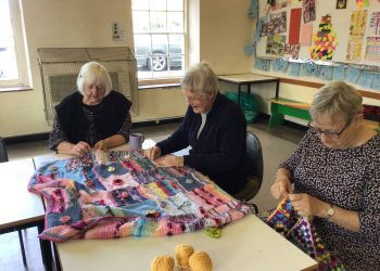 Holt villagers continue crafting for charity following poppy success