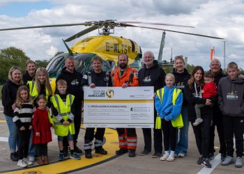 Sarum Avenue residents present £16,000 to air ambulance  during special visit