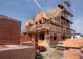 Report slams council housing firm over debt and failure to build