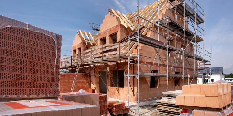Report slams council housing firm over debt and failure to build