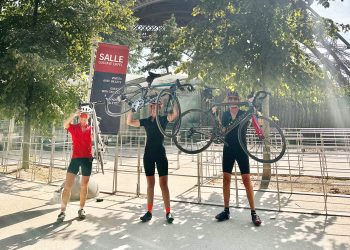 Residents complete 400-mile fundraising cycle to Paris in extreme heat