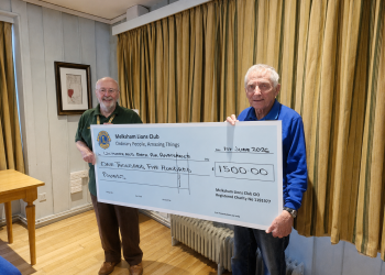 Lions donate raffle funds to air ambulance